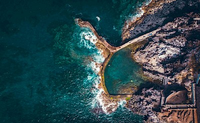 Volcanic bathing pool from above, Tenerife, Spain. Unsplash@Lucas Marcou
