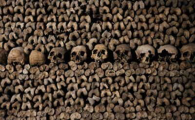 Paris catacombs, France. Unsplash: Chelms Varthoumlien