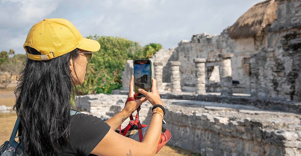 Taking a photo of the ruins, Tulum, Mexico. CC:Mexico Kan Tours