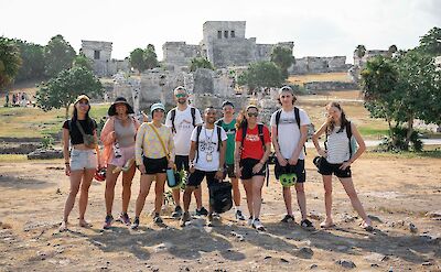 Tour group at ruins, Tulum, Mexico. CC:Mexico Kan Tours