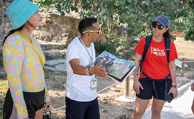 Tour guide giving commentary, Tulum, Mexico. CC:Mexico Kan Tours