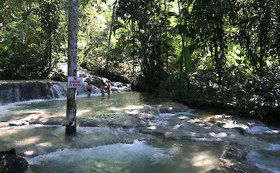 People in the distance at Dunn's River Falls, Ocho Rios, Jamaica. Alexander John@Unsplash