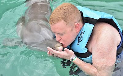 Kissing a dolphin, Ocho Rios, Jamaica.