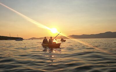 Sunset behind the kayaks, Split, Croatia. CC:Given2Fly Adventures