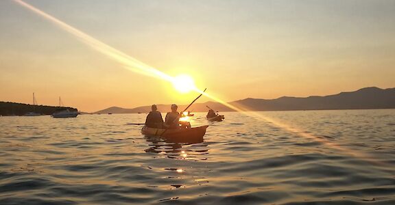 Sunset behind the kayaks, Split, Croatia. CC:Given2Fly Adventures