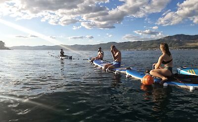 Sitting on the paddleboards, Split, Croatia. CC:Given2Fly Adventures