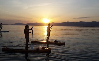 Paddleboarding at sunset, Split, Croatia. CC:Given2Fly Adventures