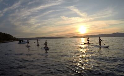 Paddleboarding on the Adriatic Sea at sunset, Split, Croatia. CC:Given2Fly Adventures