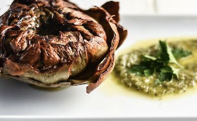 Baked artichoke and sauce, Rome, Italy. CC:Eating Europe