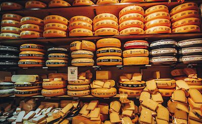 Wheels of cheese, Amsterdam, Netherlands. Dana Ward@Unsplash