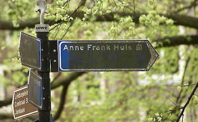 Sign to Anne Frank House, Amsterdam, Netherlands. Julius Cruickshank@Flickr