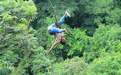 Ziplining upside-down. Clinton Mwebaze@Unsplash