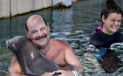 Cuddling a sea lion, Blue Lagoon Island, Bahamas. CC:El Sol Vida