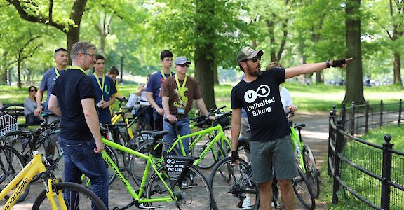 Listening to the guide, Central Park, New York, USA. CC:Unlimited Biking