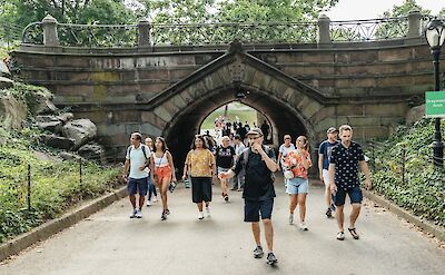 Tour guide leading the group through Central Park, New York, USA. CC:Unlimited Biking