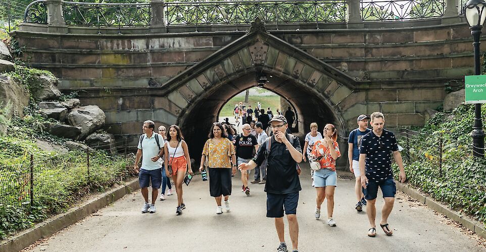 Tour guide leading the group through Central Park, New York, USA. CC:Unlimited Biking