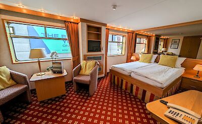 Sitting area in the Junior Suite aboard the MS Rigoletto | Holland Bike & Boat Tours