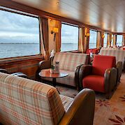 Comfortable window side seats in the saloon/bar | Rigoletto | Bike & Boat Tour