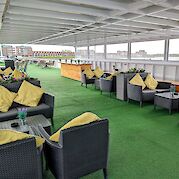 Covered seating area on the sundeck | Rigoletto | Bike & Boat Tour