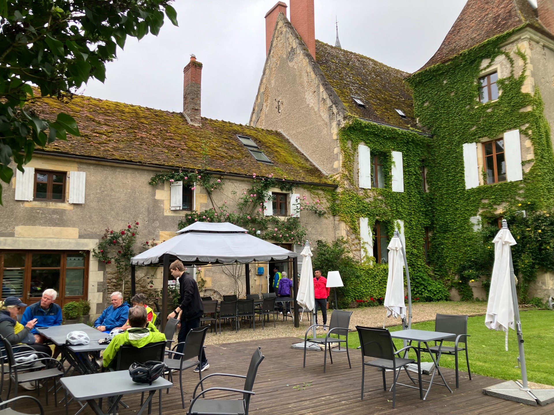 The group breaks for coffee at a converted château - Tripsite Traveler