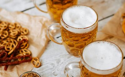 Sampling German beer. Unsplash: Kateryna Hliznitsova