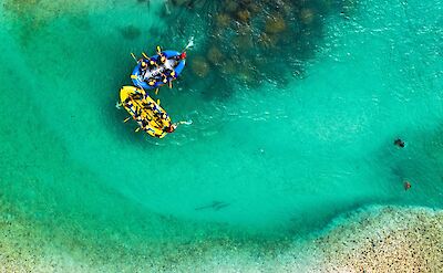 Rafting the clear waters of the Soca River. -to