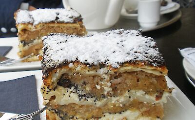 Slovenian gibanica, or layered cake, is a traditional dessert that features layers of poppy seeds, walnuts, apples, raisins, and ricotta. Flickr:Amanda Slater