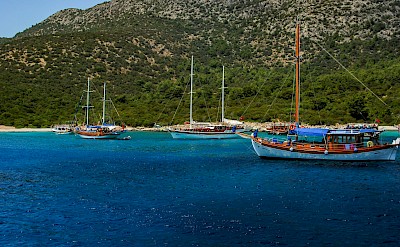 Ships along the coast near Bodrum, Turkey. Unsplash@Engin Yapici