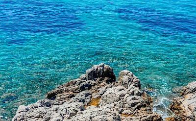 Standing on the cliffs, Bodrum, Turkey. Unsplash@Joy S