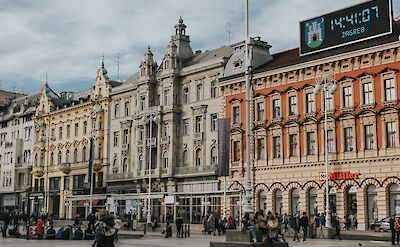 Elegant historic buildings lining a central square in Zagreb, Croatia. unsplash@Kristjan Arsov