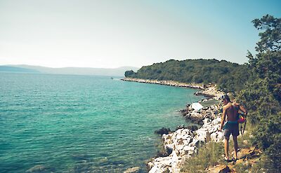 Hiking along the coast of Krk, Croatia hiking tour. Unsplash@David Gabric