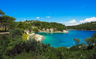 Turquoise bay and coastal village along Croatia&rsquo;s Adriatic shoreline. unsplash@Antehamersmit