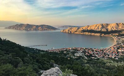 Hilltop coastal views overlooking a traditional Croatian island village. toST