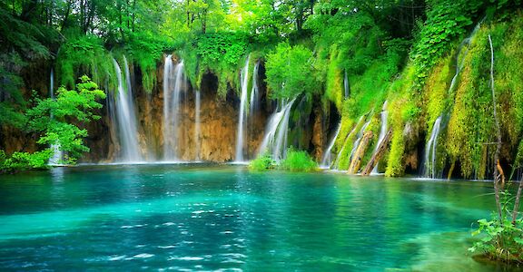 Waterfalls and foliage in Plitvice Lakes National Park, Croatia hiking tour. Unsplash@Getty Images