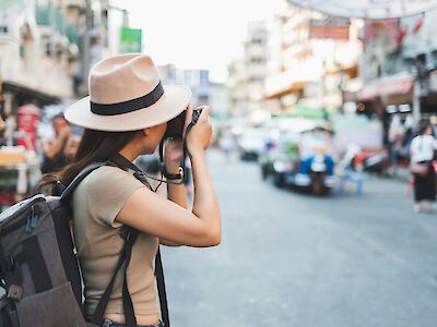 Taking a photograph on a corporate retreat. Getty Images@Unsplash