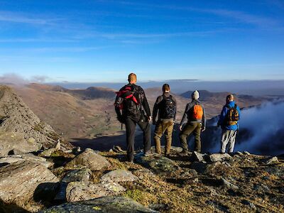 Colleagues on a hiking tour during a corporate away day. Iolo Harris@Unsplash