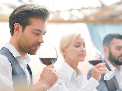 Wine tasting workshop on a corporate retreat. Getty Images@Unsplash