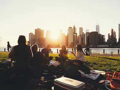 Picnic at sunset during a corporate meet up. Ben Duchac@Unsplash