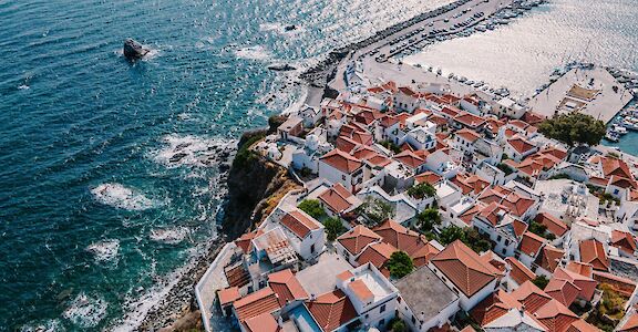 Views above the beautiful Skiathos Town. unsplash:nikola radojcic 39.163834, 23.486695