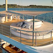 Upper deck lounge and hot tub | Bellezza | Bike & Boat Tour