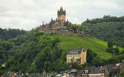 Cochem Castle perched atop a hill, Germany. Unsplash@Tharun Thejus