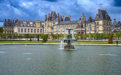 Fontainebleau is famous for its historic château and expansive forest.  Flickr:XiquinhoSilva 