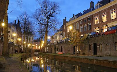 Lights along the canal, Utrecht, Netherlands. Unsplash:Martin Woortman