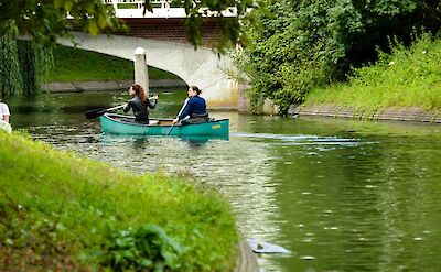 Rowing on the river, Utrecht, Netherlands. Unsplash:Joao Guimaraes