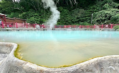 Steam rises from pale blue waters in one of Beppu’s many hot springs. flickr@Bryan