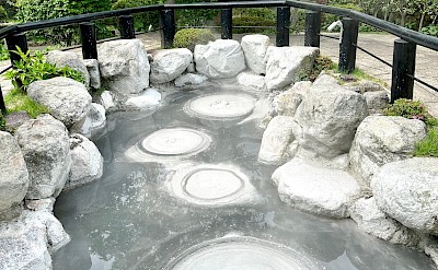 Oniishibozu Jigoku, one of Beppu’s hot springs, known for its gray mud pools that resemble the shaved heads of monks. Flickr@Bryan