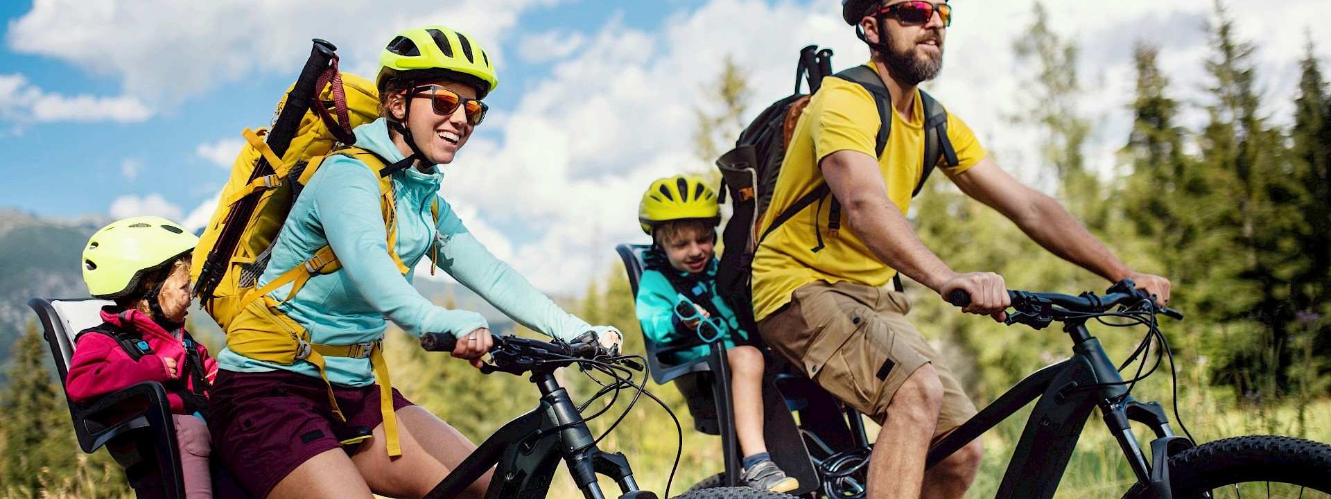 A family on a bike tour holiday. Unsplash@Getty Images