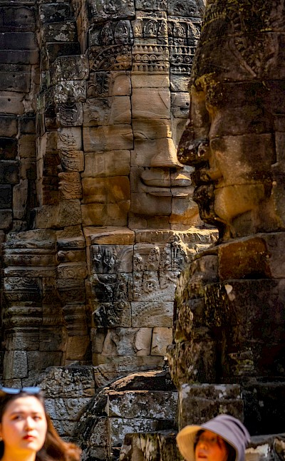 Faces in the stones, Angkor Wat, Cambodia bike tour. Unsplash@Angkor Feel
