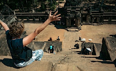 High up at Angkor Wat, Cambodia bike tour. Unsplash@Daniel Bernard