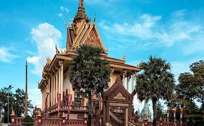 Intricate temple in Phnom Penh, Cambodia bike tour. Unsplash@S Ratanak